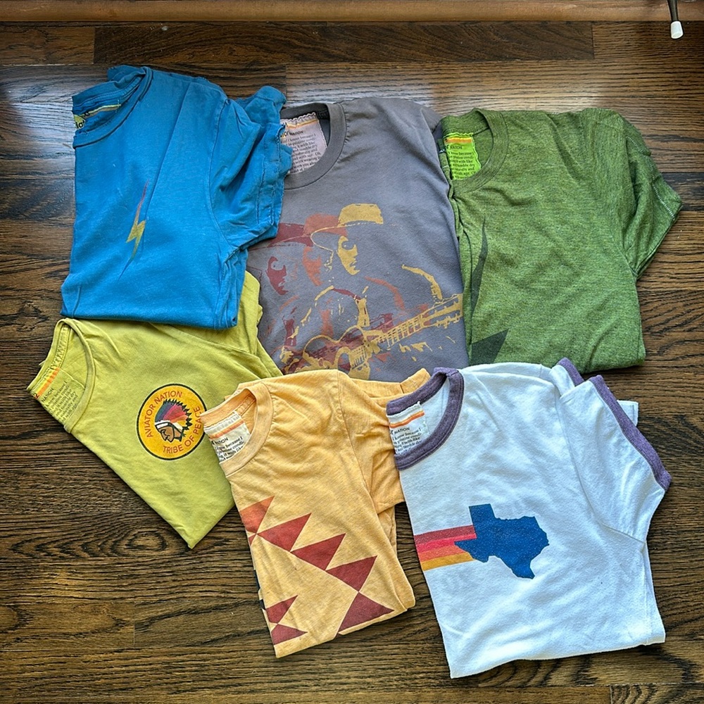 This is a collection of Aviator Nation T-shirts.  Each of them were $60.